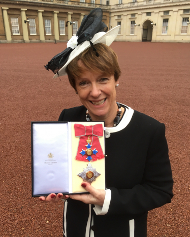 Dame Caroline Spelman MP at Buckingham Palace